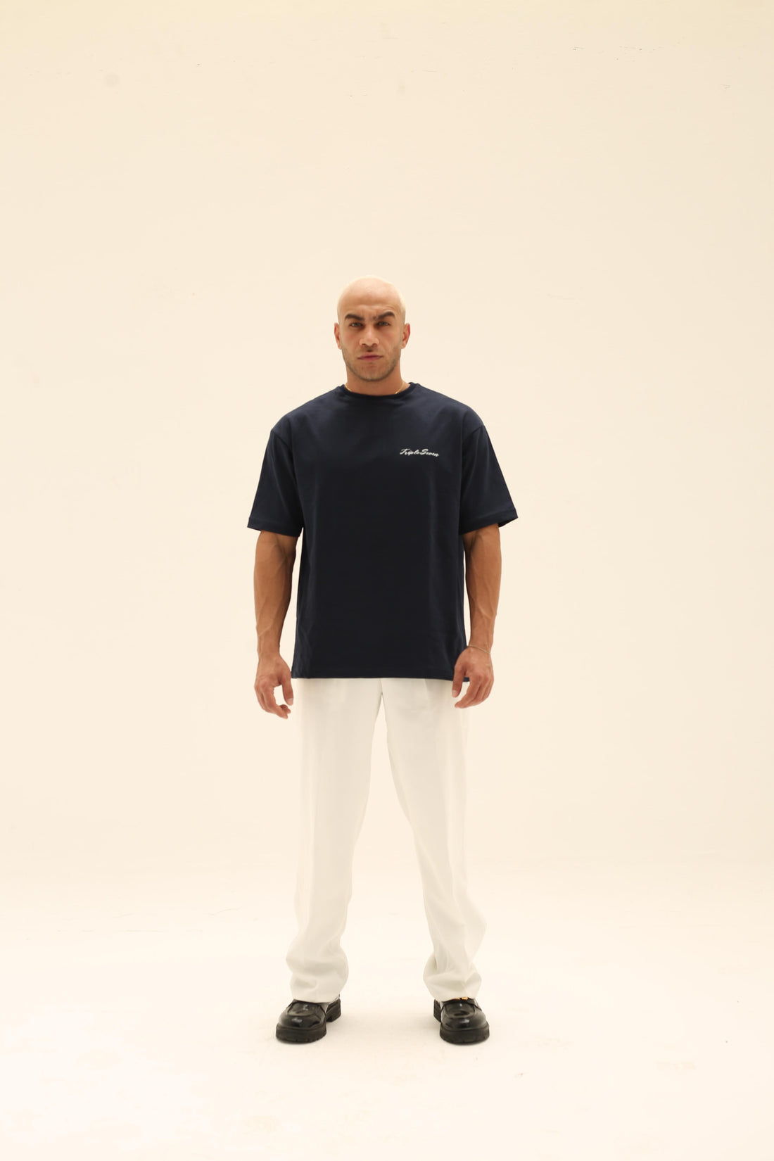 T7 Core t-shirt (navy blue with white T flower detailing)